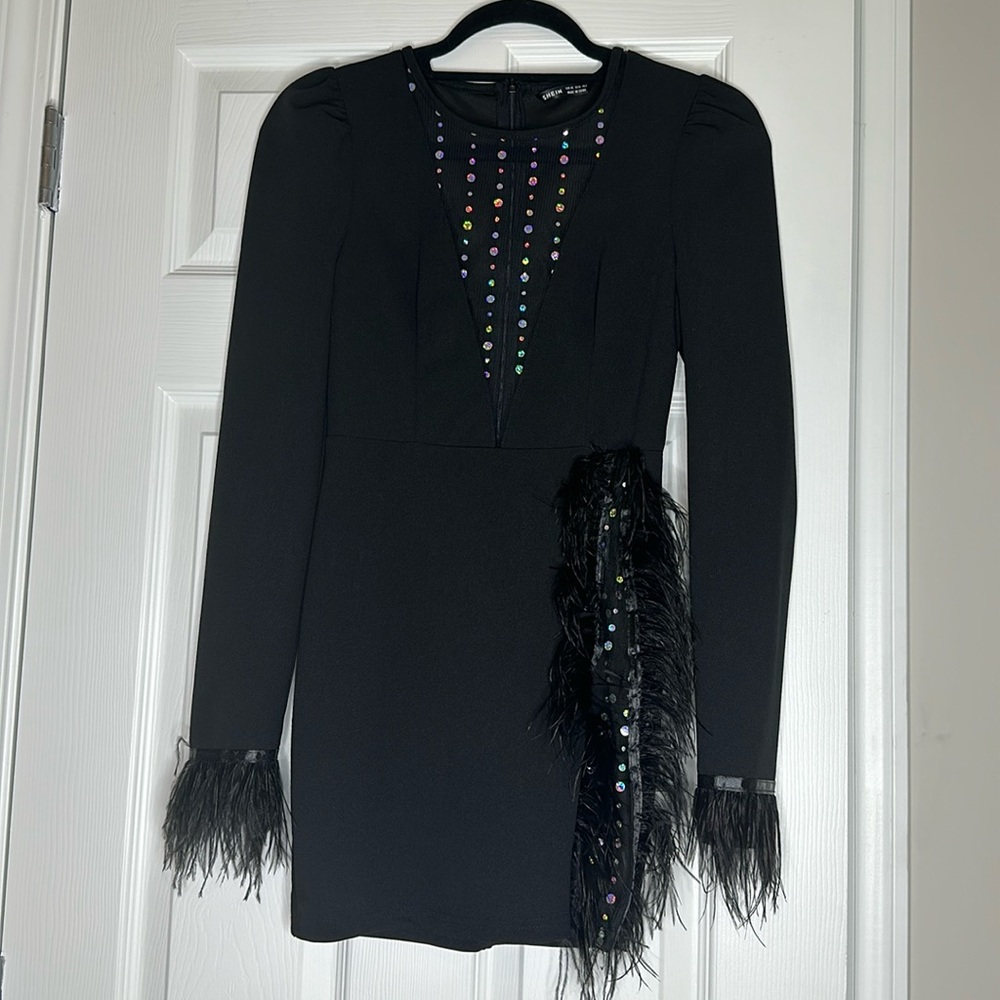 Black mini dress with feathers